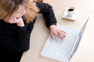 woman working using laptop